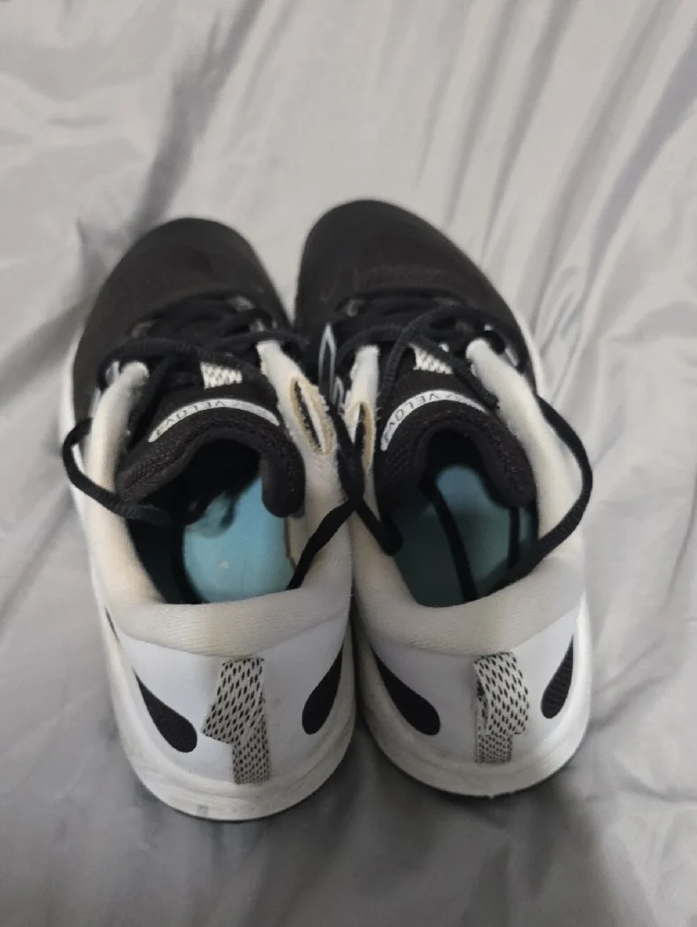 New Balance Men's Black and White Running Sneakers